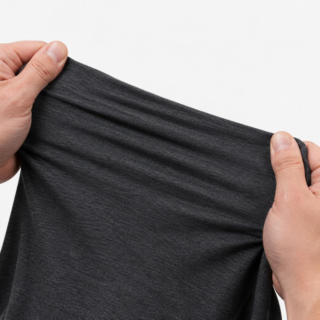 Hands stretching the Core One bamboo fabric